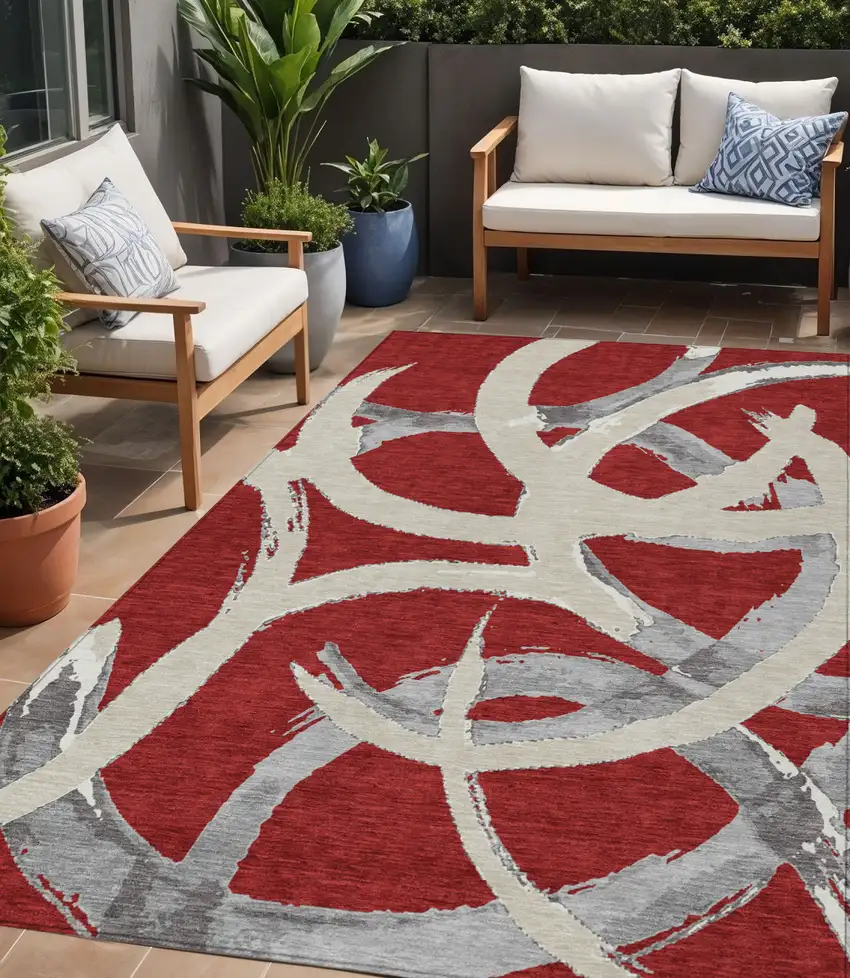 Red Beige And Gray Abstract Washable Indoor Outdoor Area Rug Photo 1