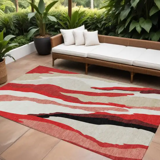 Red Black And Beige Abstract Washable Indoor Outdoor Area Rug Photo 1