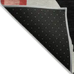 Photo of Red Black And Beige Abstract Washable Indoor Outdoor Area Rug