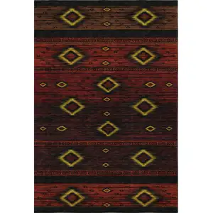 Photo of Red Black And Gold Tribal Washable Area Rug With UV Protection