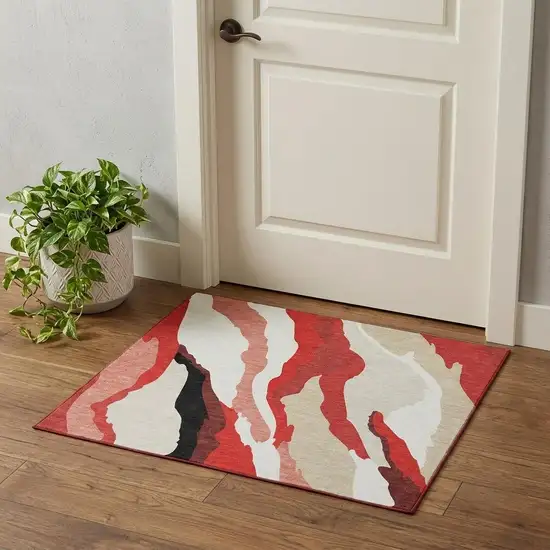 Red Black And Ivory Abstract Washable Area Rug With UV Protection Photo 1