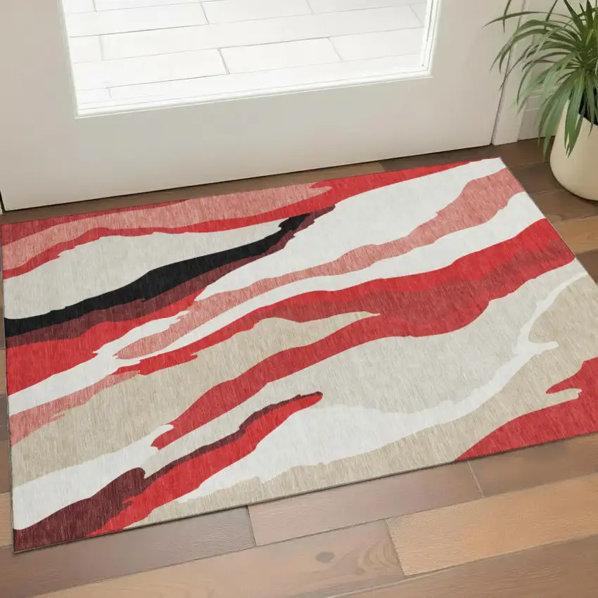 Red Black And Ivory Abstract Washable Area Rug With UV Protection Photo 1