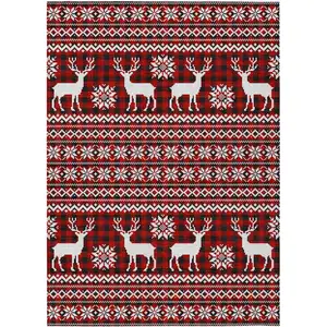 Photo of Red Black And Ivory Animal Print Washable Indoor Outdoor Area Rug
