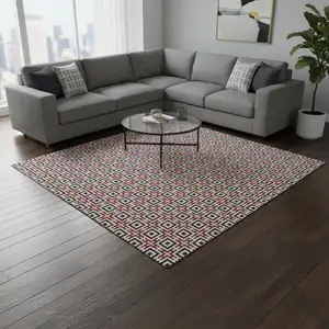 Photo of Red Black And Ivory Geometric Washable Area Rug With UV Protection