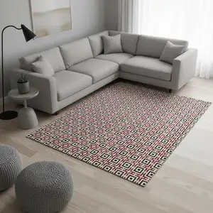 Photo of Red Black And Ivory Geometric Washable Area Rug With UV Protection
