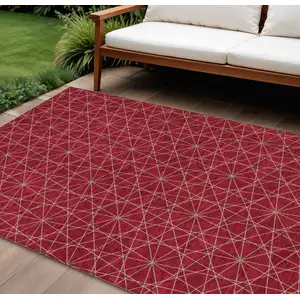 Photo of Red Black And Ivory Geometric Washable Indoor Outdoor Area Rug
