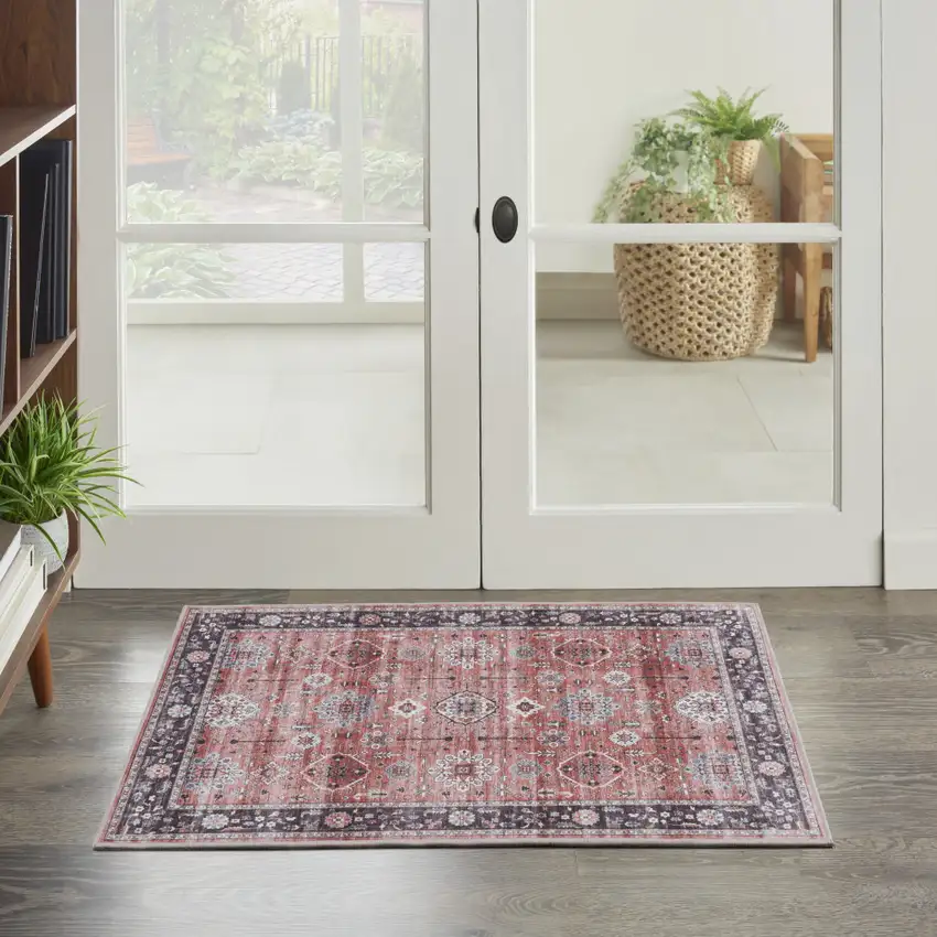 Red Black And Ivory Oriental Distressed Area Rug Photo 3