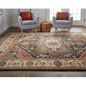 Photo of Red Black And Ivory Wool Floral Hand Knotted Stain Resistant Area Rug