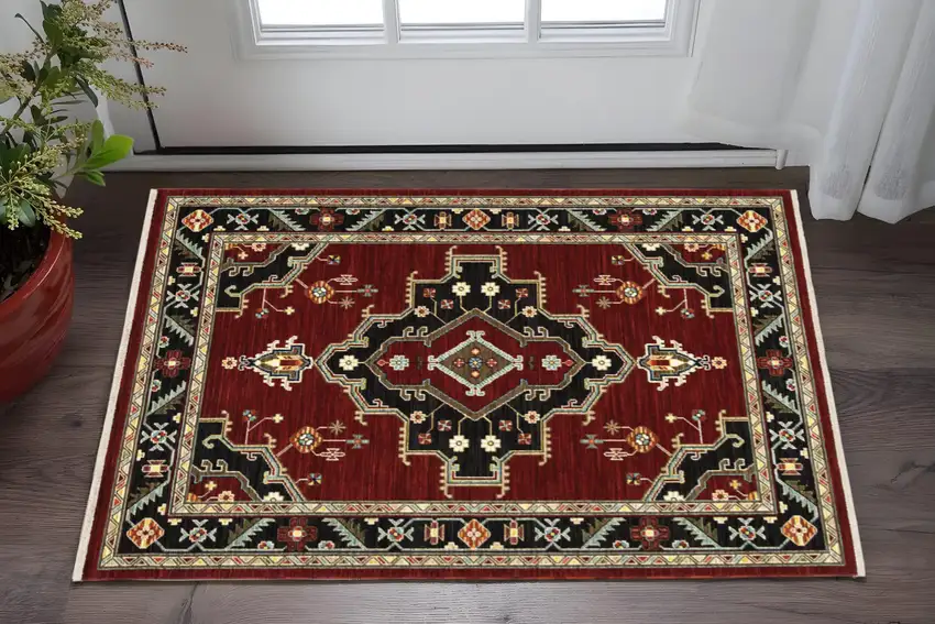 Red and Black Medallion Power Loom Area Rug Photo 1