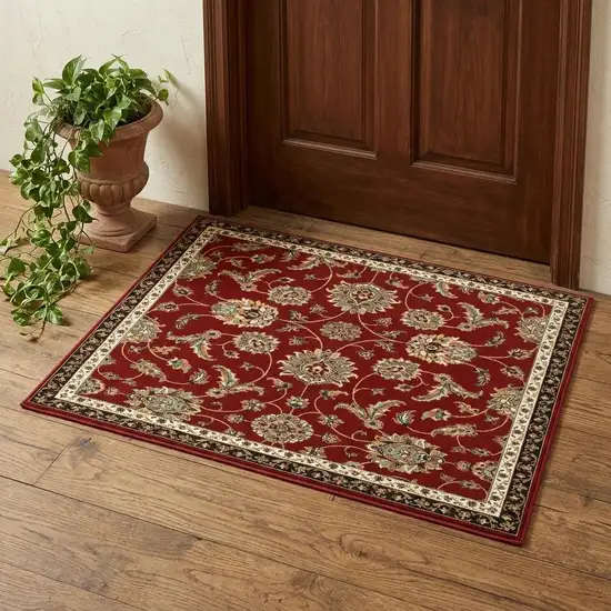 2' X 4' Red Black Blue Ivory Green And Salmon Oriental Power Loom Stain Resistant Area Rug Photo 1