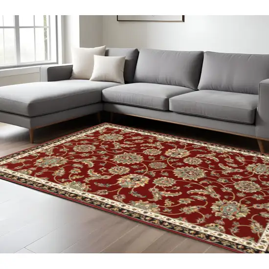 Red Black Blue Ivory Green And Salmon Oriental Power Loom Stain Resistant Area Rug Photo 1