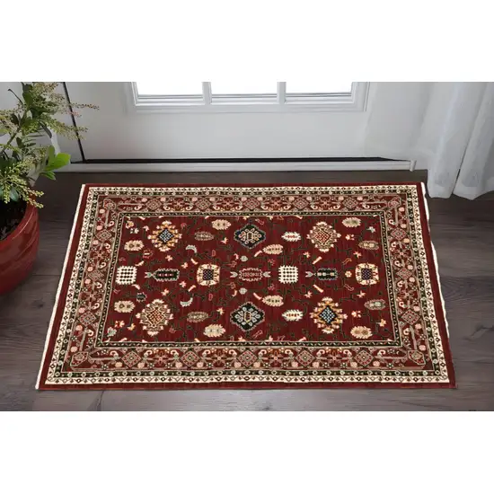 Red Black Ivory And Brown Oriental Power Loom Stain Resistant Area Rug With Fringe Photo 1
