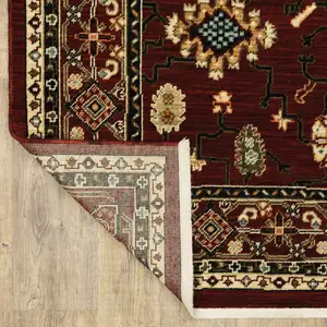 Photo of Red Black Ivory And Brown Oriental Power Loom Stain Resistant Area Rug With Fringe
