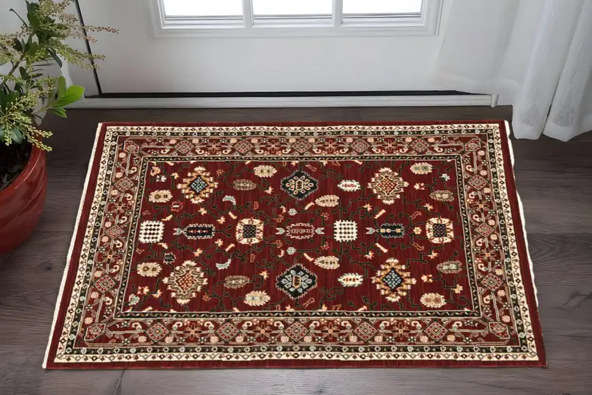 Red Black Ivory And Brown Oriental Power Loom Stain Resistant Area Rug With Fringe Photo 1