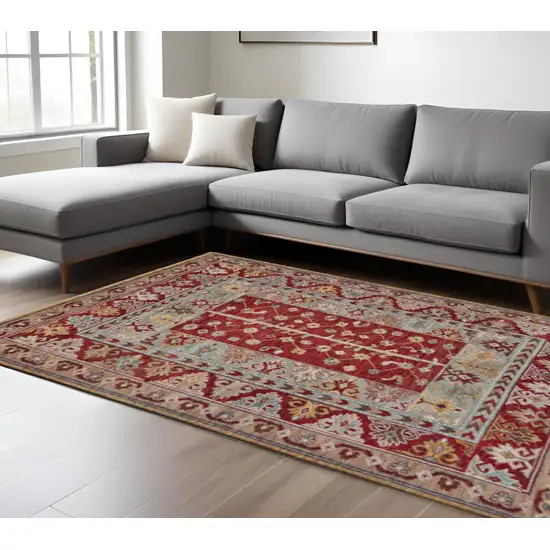 Red Blue And Brown Wool Floral Hand Knotted Distressed Stain Resistant Area Rug With Fringe Photo 1