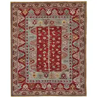 Photo of Red Blue And Brown Wool Floral Hand Knotted Distressed Stain Resistant Area Rug With Fringe