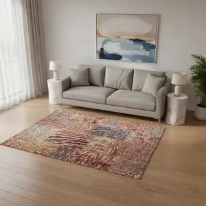 Photo of Red Blue And Gold Patchwork Washable Area Rug With UV Protection