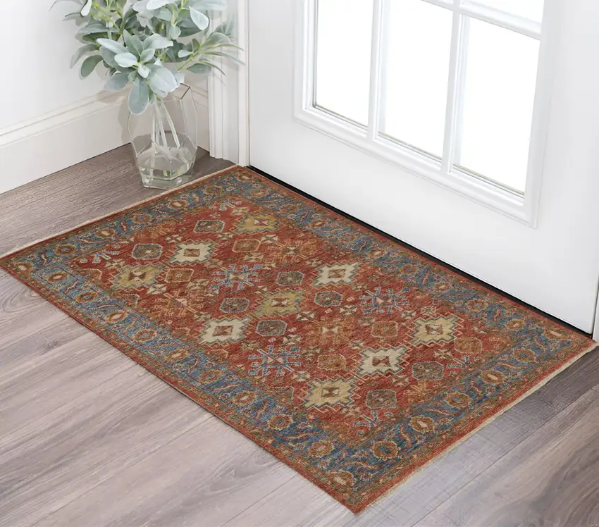 Blue and Red Wool Floral Hand Knotted Area Rug With Fringe Photo 1