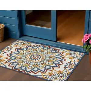 Photo of Red Blue And Yellow Medallion Indoor Outdoor Area Rug