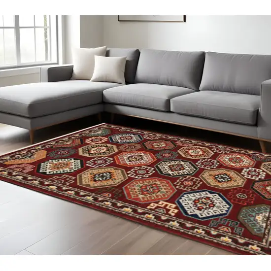 6' X 9' Red Blue Brown And Beige Oriental Power Loom Stain Resistant Area Rug With Fringe Photo 1