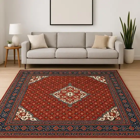 Red Blue Ivory And Orange Oriental Power Loom Stain Resistant Area Rug With Fringe Photo 2