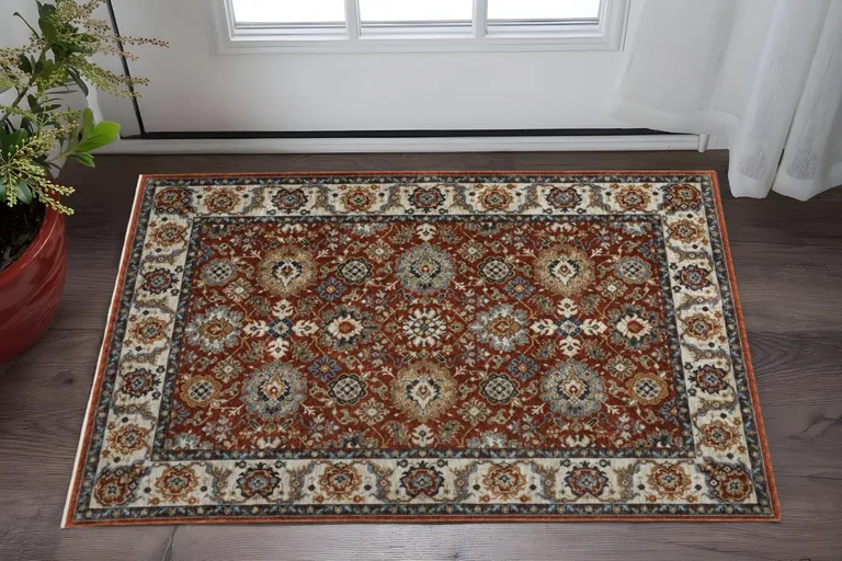 Red Blue Ivory Gold And Navy Oriental Power Loom Stain Resistant Area Rug With Fringe Photo 1