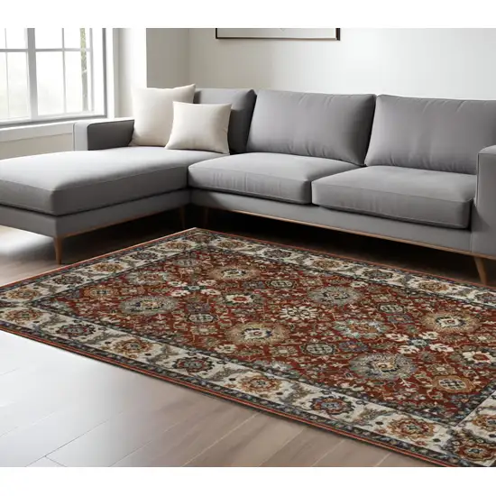 Red Ivory And Orange Oriental Area Rug With Fringe Photo 1