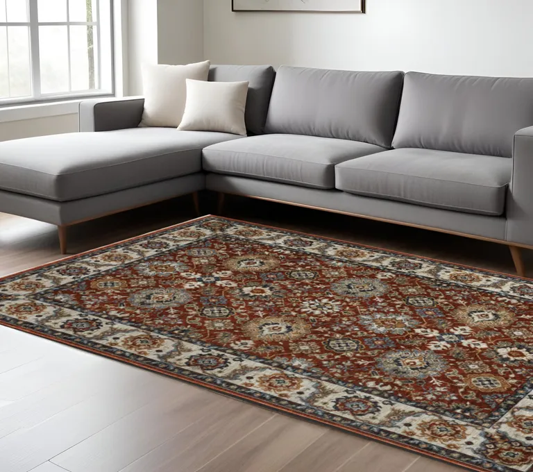 Red Blue Ivory Gold And Navy Oriental Power Loom Stain Resistant Area Rug With Fringe Photo 2