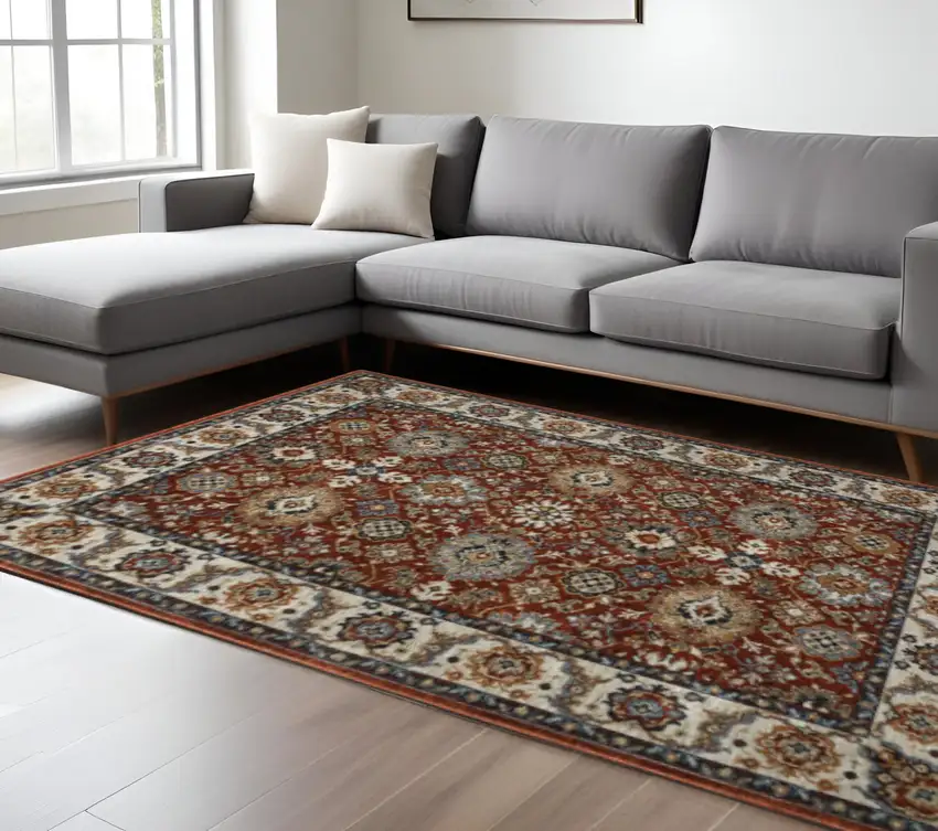 Red Blue Ivory Gold And Navy Oriental Power Loom Stain Resistant Area Rug With Fringe Photo 1