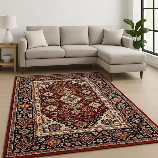 6' X 9' Red Blue Orange And Beige Oriental Power Loom Stain Resistant Area Rug With Fringe Photo 1