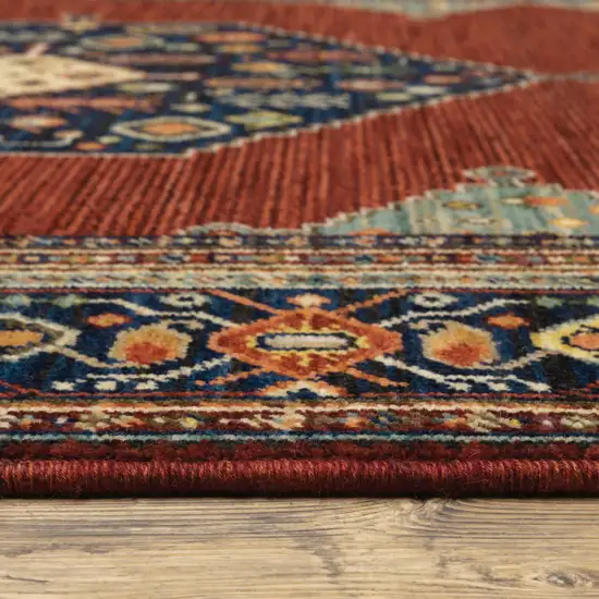Red Blue Orange And Ivory Oriental Power Loom Stain Resistant Area Rug With Fringe Photo 3