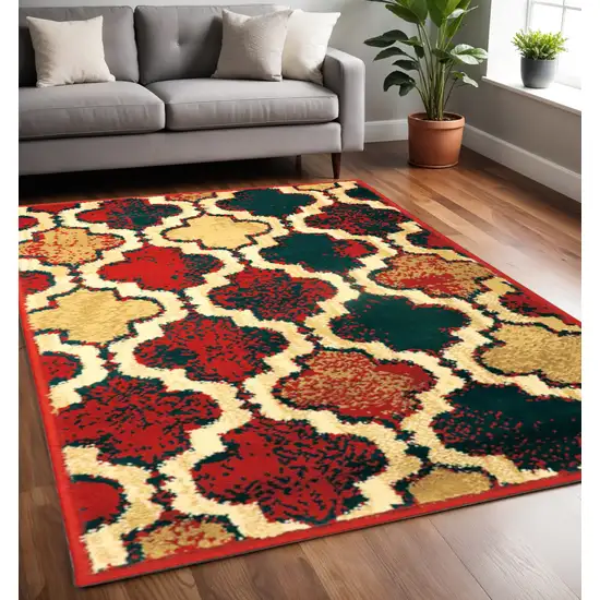 Blue And Red Quatrefoil Distressed Area Rug Photo 1