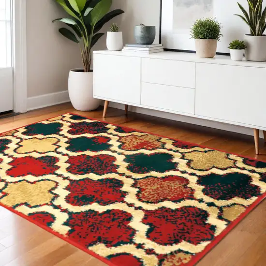 Blue And Red Quatrefoil Distressed Area Rug Photo 1