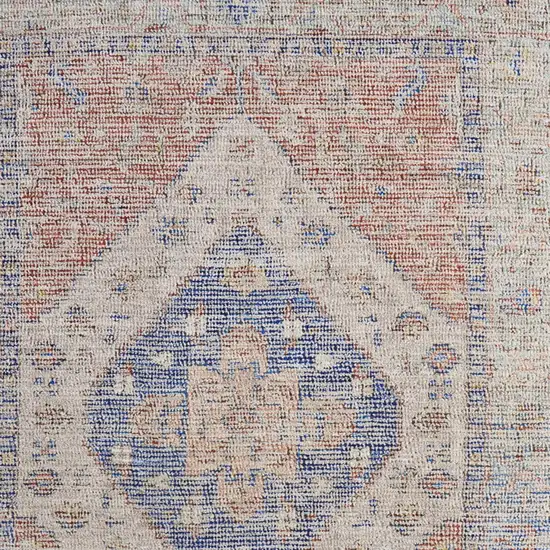 Red Blue and Ivory Abstract Hand Woven Distressed Area Rug With Fringe Photo 9