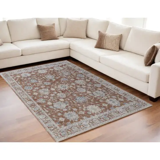 Red Blue and Ivory Floral Power Loom Worn Faded Area Rug With Fringe Photo 1