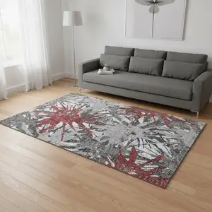 Photo of Red Charcoal And Gray Abstract Washable Area Rug With UV Protection