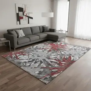 Photo of Red Charcoal And Gray Abstract Washable Area Rug With UV Protection