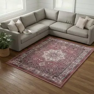 Photo of Red Floral Distressed Area Rug