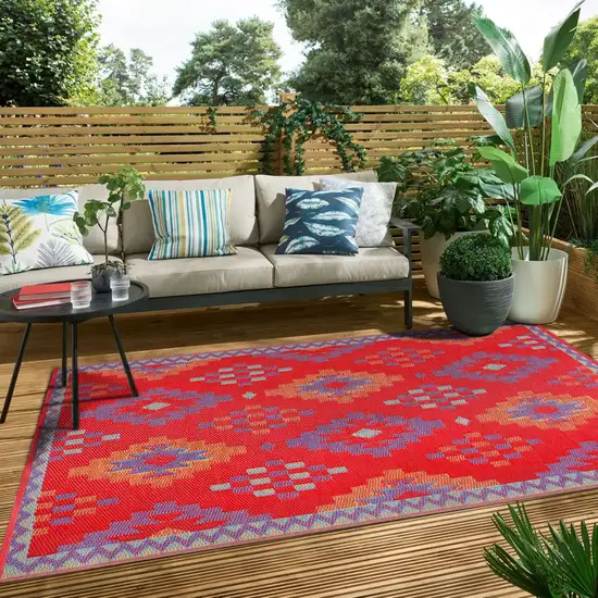 Red Geometric Machine Braided Distressed Area Rug With UV Protection Photo 7