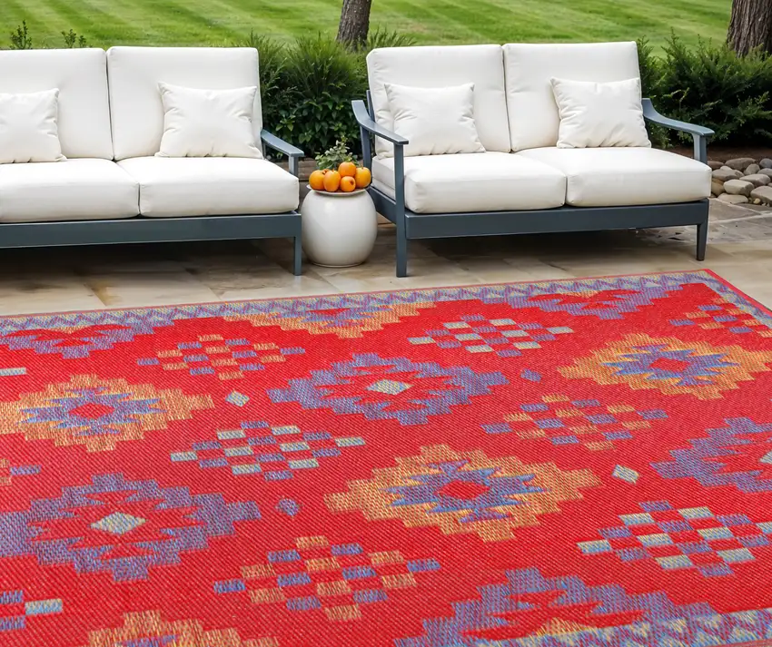 Red Geometric Machine Braided Distressed Area Rug With UV Protection Photo 1