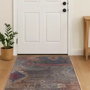 Photo of Red Geometric Power Loom Worn Faded Area Rug