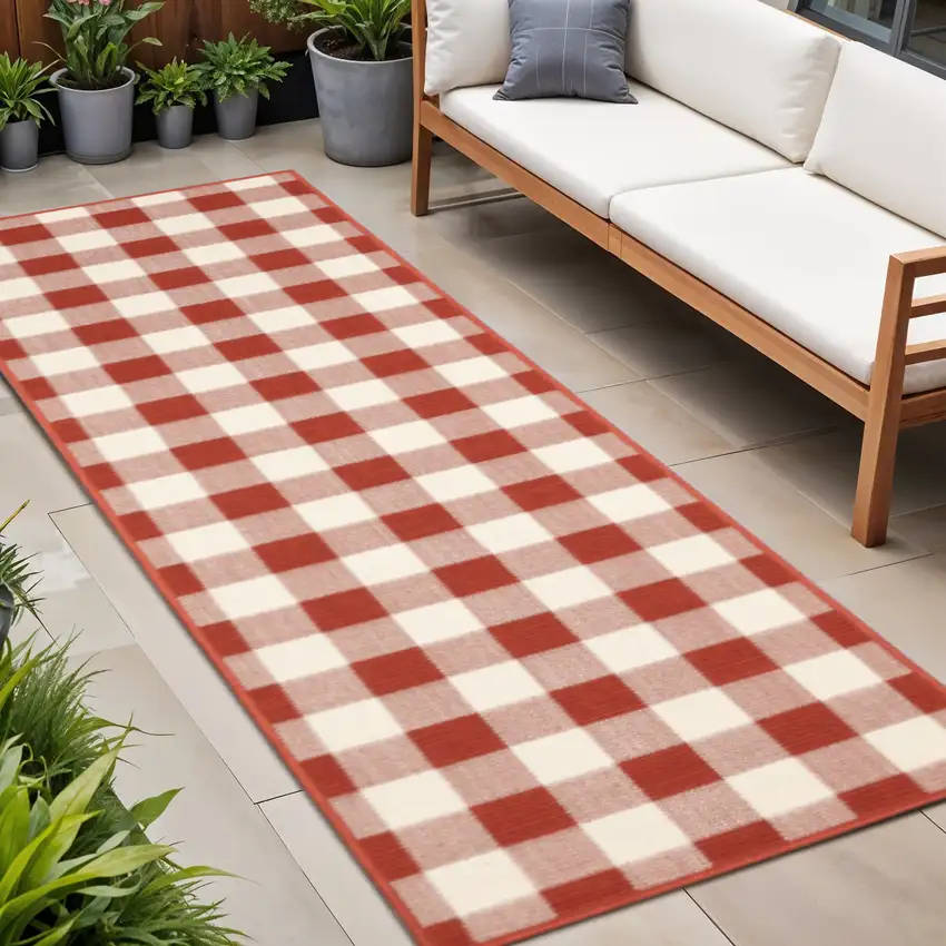 Red and Ivory Geometric Stain Resistant Indoor Outdoor Area Rug Photo 1
