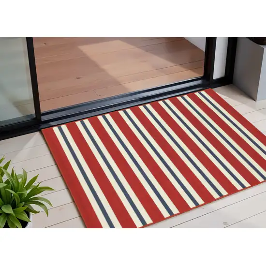 Red and Ivory Geometric Stain Resistant Indoor Outdoor Area Rug Photo 1