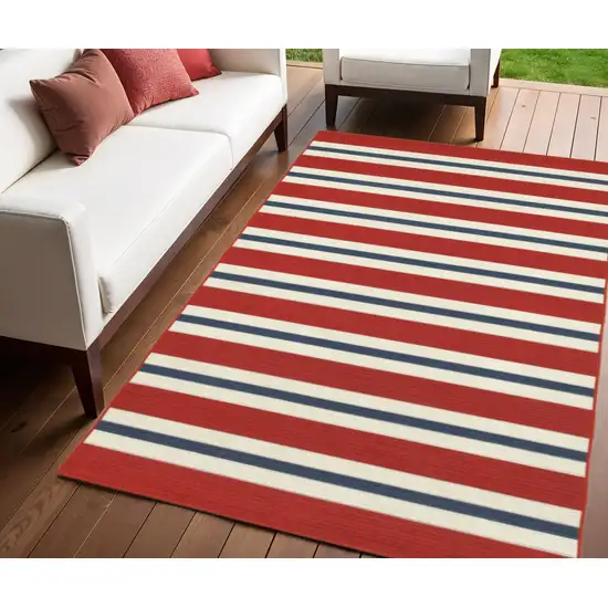 Red and Ivory Geometric Stain Resistant Indoor Outdoor Area Rug Photo 1