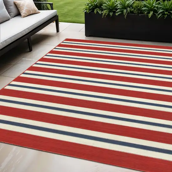 Red and Ivory Geometric Stain Resistant Indoor Outdoor Area Rug Photo 1