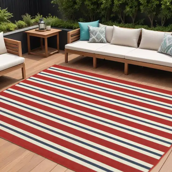 Red and Ivory Geometric Stain Resistant Indoor Outdoor Area Rug Photo 1