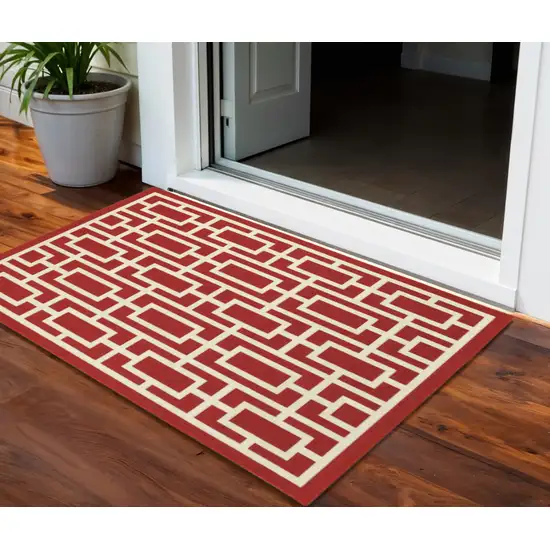 Red and Ivory Geometric Stain Resistant Indoor Outdoor Area Rug Photo 1