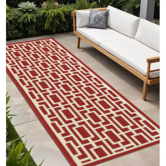 Red and Ivory Geometric Stain Resistant Indoor Outdoor Area Rug Photo 1