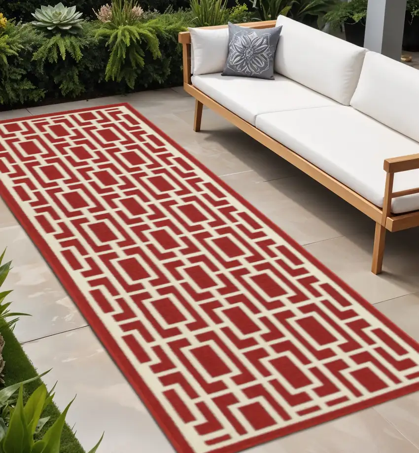 Red and Ivory Geometric Stain Resistant Indoor Outdoor Area Rug Photo 1