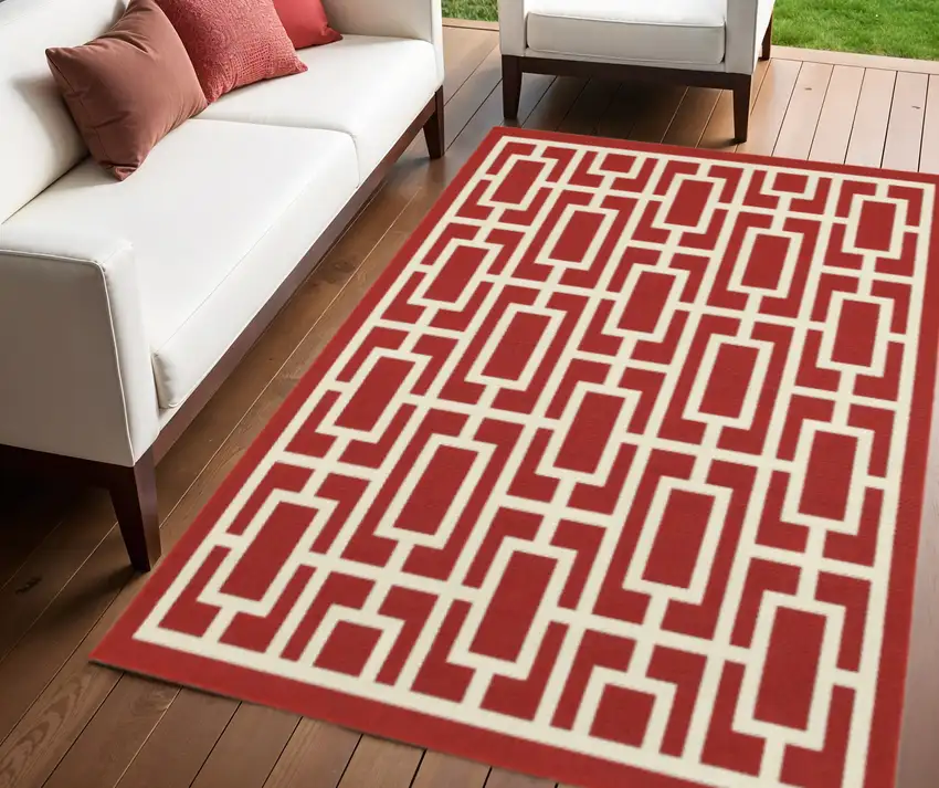 Red and Ivory Geometric Stain Resistant Indoor Outdoor Area Rug Photo 1